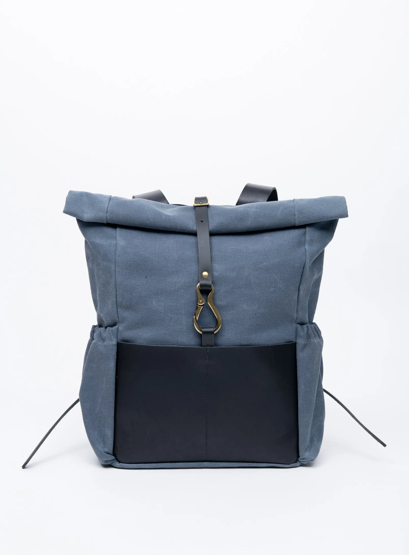 Roll top leather and waxed coton backpack DE LORIMIER model