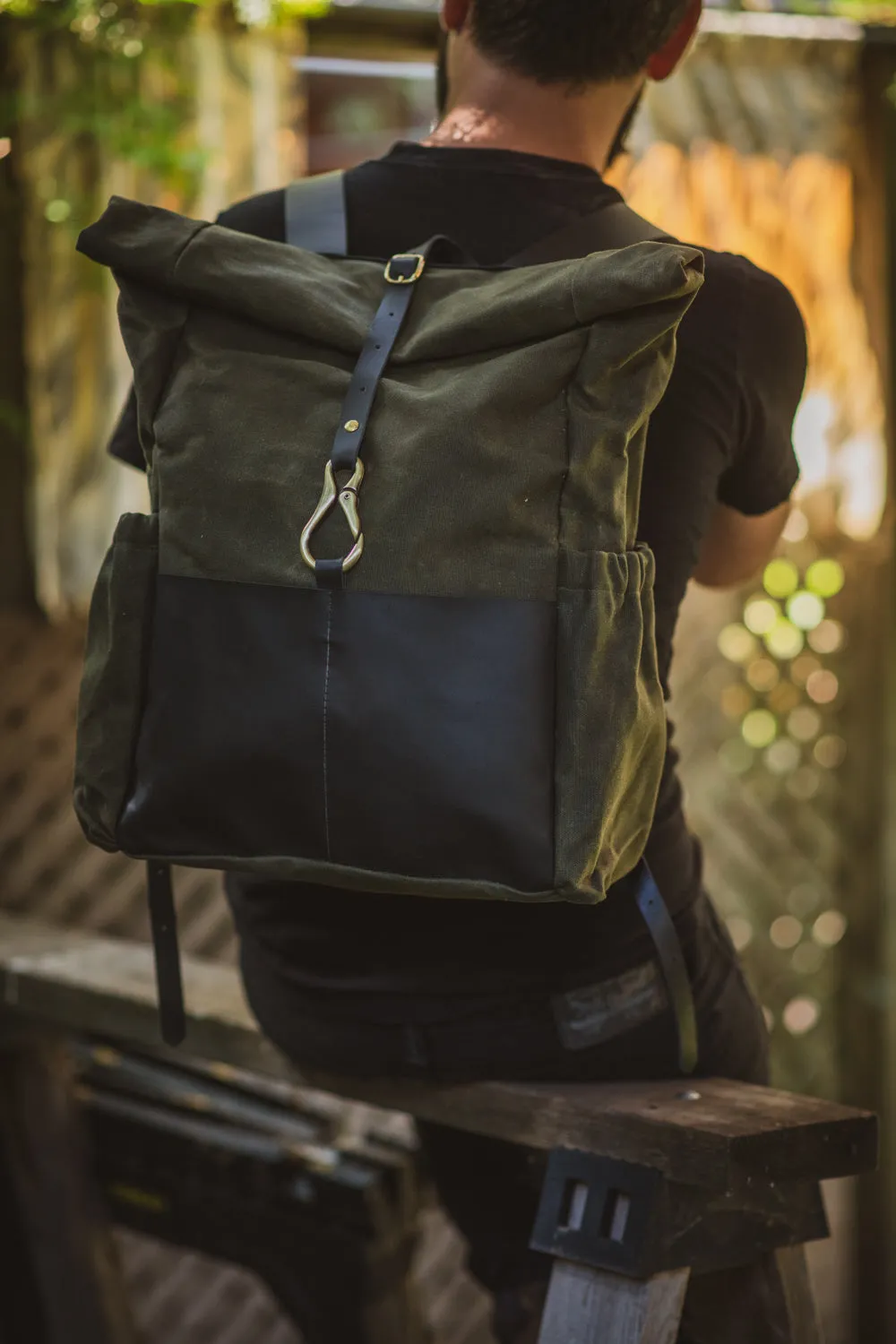 Roll top leather and waxed coton backpack DE LORIMIER model