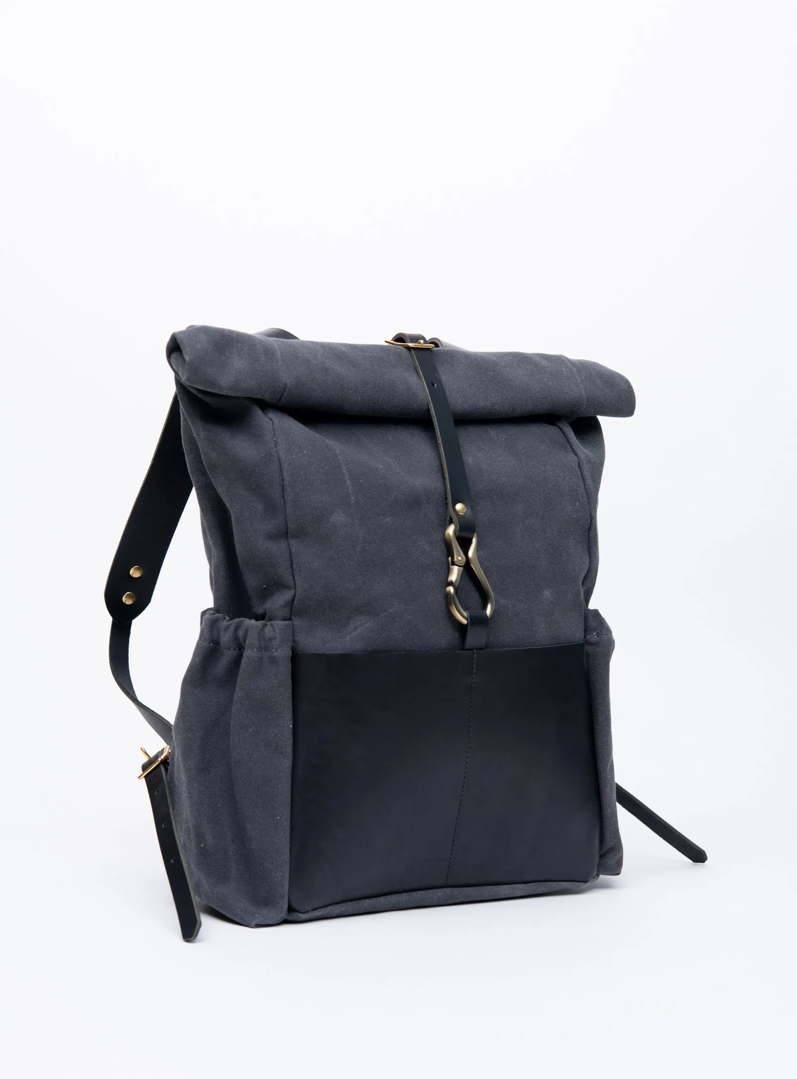 Roll top leather and waxed coton backpack DE LORIMIER model