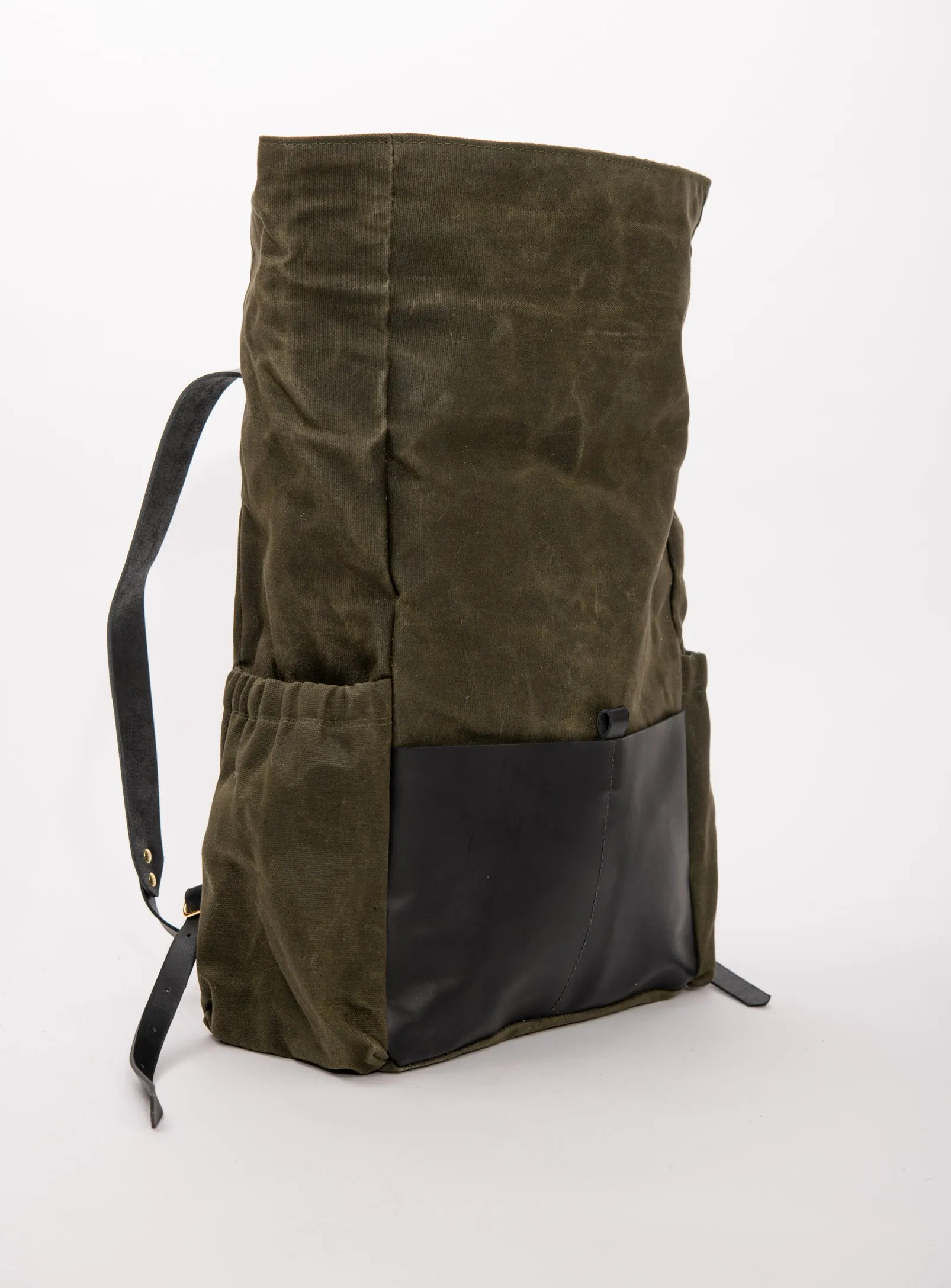 Roll top leather and waxed coton backpack DE LORIMIER model